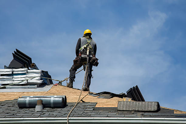 Professional Roofing technician working in Rock, WV
